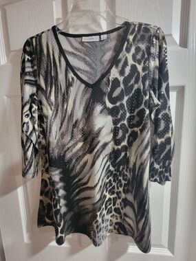 Sparkly Susan Graver top. Size XS. Has a cool animal print w/leopard and zebra